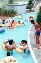 Kids and families having fun at a water park