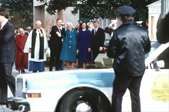 Members of the clergy stand beside President-elect George H.W. Bush