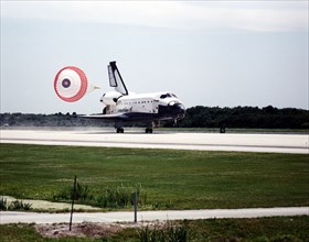 The Space Shuttle Columbia hurtles down Runway 33