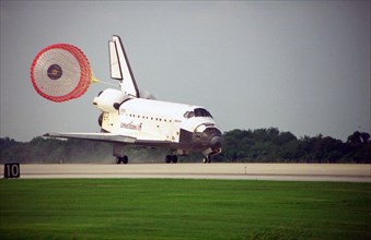 The orbiter drag chute deploys after Atlantis