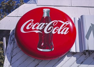 1980s United States -  Coke Disc Todd's Cafe sign, Dakota City, Iowa 1987
