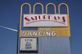 2000s America -  Saturday Nude Dancing sign, Aurora, Colorado 2004