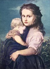 A Child Holding His Sister Baby