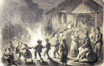 Children Dance Around A Campfire