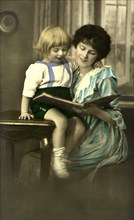 Mother Reading to Child.