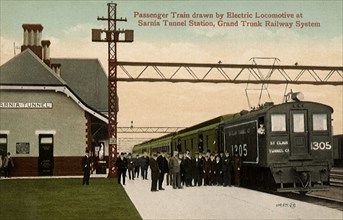 Passenger Train drawn by Electric Locomotive.