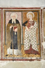 Sant'antonio Abate and Santa Lucia. 15th Century Umbrian School Fresco Cycle. Church of San Giovanni Battista. Arrone. Valnerina. Umbria. Italy