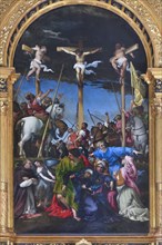 Crucifixion by Lorenzo Lotto. Church of Santa Maria In Telusiano. Monte San Giusto. Marche. Italy