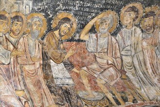 Otranto (Italy, Puglia, Lecce province) church of San Pietro, building of the IX-X century. Washing of the Feet (Christ nimbato), fresco, 10th-11th century