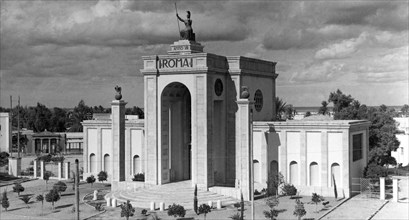 VIIe année de l'ère fasciste. le pavillon romain à la foire de tripoli. 1929