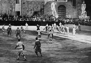 europe, italie, toscane, florence, joueurs pendant un match de football, 1920 1930