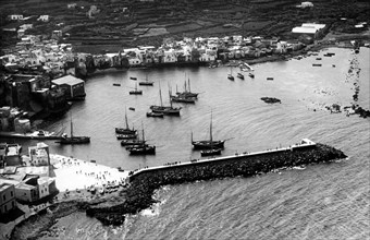 Europe, Italy, Sicily, Trapani, Pantelleria, aerial view of the port, 1920-30