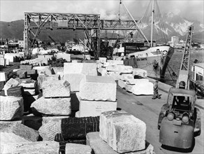 marble blocks, harbour, marina di carrara, tuscany, italy 1965