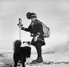 Lapp boy with his dog, finland, 1939