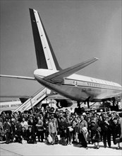 Départ d'un vol charter, 1967