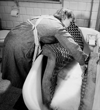Foam mattress washing. 1948