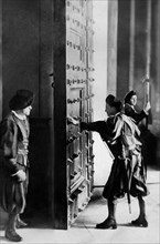 Swiss papal guards during the first complete opening of the bronze door. 1920