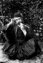 Albanian smokes a pipe in the Islamic era.