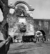Fontana di clemente XII. porta furba. rome 1950