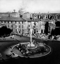 Fountain of the naiads and the basilica of santa maria degli angeli and martyrs. piazza dell'Esedra today piazza della repubblica. rome 1950