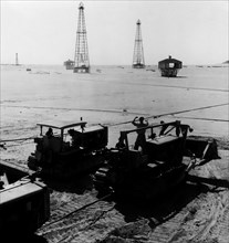Asia. kuwait. burgan. oil wells. 1950