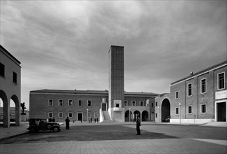 Piazza Del Comune And Casa Del Fascio. Aprilia. 1920-30
