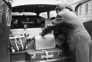 Luggage In The Trunk Of A 1950 Car