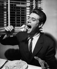 Man Eating Italian Food. Tortelli With Vegetables. 1964