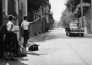 Rome. Young German Tourists Hitchhike On The Via Cassia. 1960