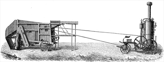 Small mobile steam thresher.