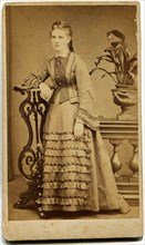 An antique photo shows woman.