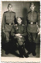 Guard sergeant and two soldiers of the Soviet Army.