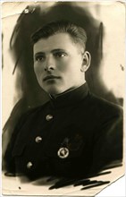 A young man in uniform.