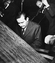 Romano Mussolini at the piano.