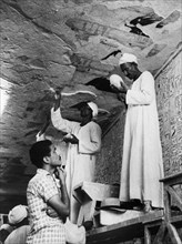 Restoration work on the hieroglyphs of the tomb of seti I.