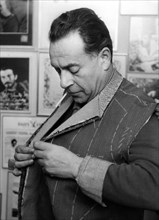 Rome, the painter Renato Guttuso at the tailor.