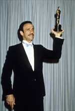 Fahrid Murray Abraham With Oscar Award.