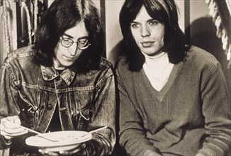 John Lennon and Mick Jagger.