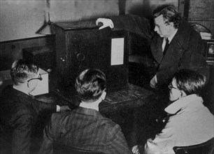 The The Inventor Of Television John Logie Baird In A Public Demonstration Of His Apparatus.