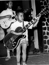 Child Plays Elettric Guitar.
