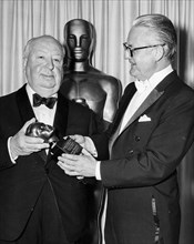 Alfred Hitchcock and Robert Wise.