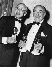 George Cukor and Jack L. Warner.