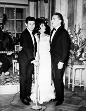 Eddie Fisher, Elizabeth Taylor and Kirk Douglas.