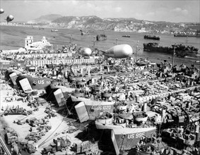 Allied Cargo Ships Unload In A Port In Southern Italy.