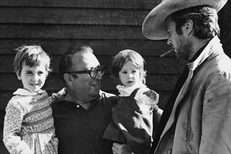 Sergio leone whith his daughters, clint eastwood, 1966