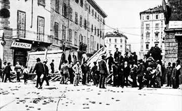 The barricades of revolt before the repression of the general fiorenzo bava beccaris, milan, 1898