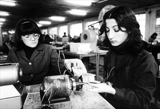 Italy, workers at work in an electrotechnical factory, 70s