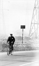 Italy, Lombardy, worker cycling
