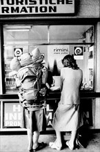 Tourists at the station, rimini, 70s