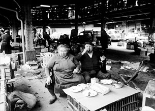 Lunch at the poultry market, Porta Palazzo, Torino, Italy, 1970